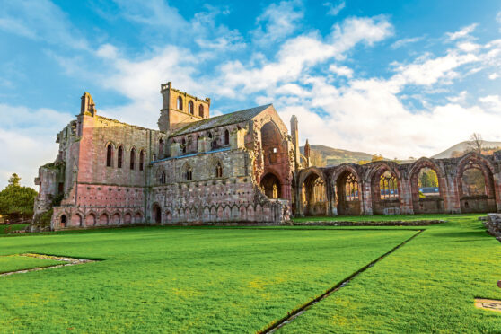 The ruins of Melrose Abbey originally founded in 1136