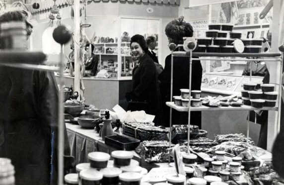 The Queen visits a stand run by the WI at the Ideal Home Exhibition 
at Olympia, London in 1968