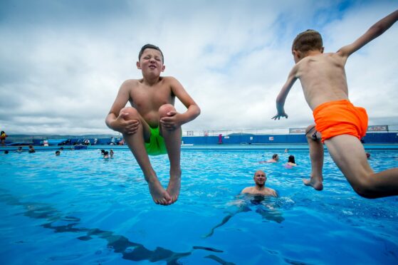 Children and adults enjoy the hot summer weather at Gourock Outdoor Pool yesterday