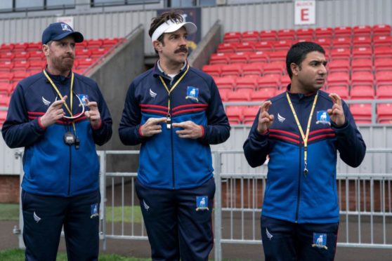 Brendan Hunt, Jason Sudeikis, and Nick Mohammed in Ted Lasso