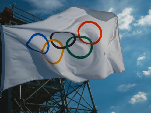 Olympics flag inside Tokyo Olympics beach volleyball stadium