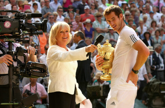 Sue Barker with new Wimbledon champ Andy Murray in 2013