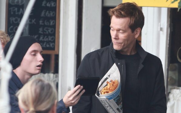 Actor Kevin Bacon films an advert for EE in New York in 2014