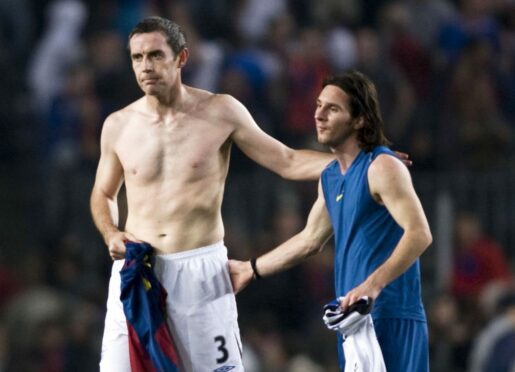 David Weir swaps shirts with Lionel Messi after Rangers had faced Barcelona in the Champions League in 2007.