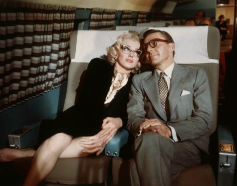 Marilyn Monroe and David Wayne in How To Marry A Millionaire