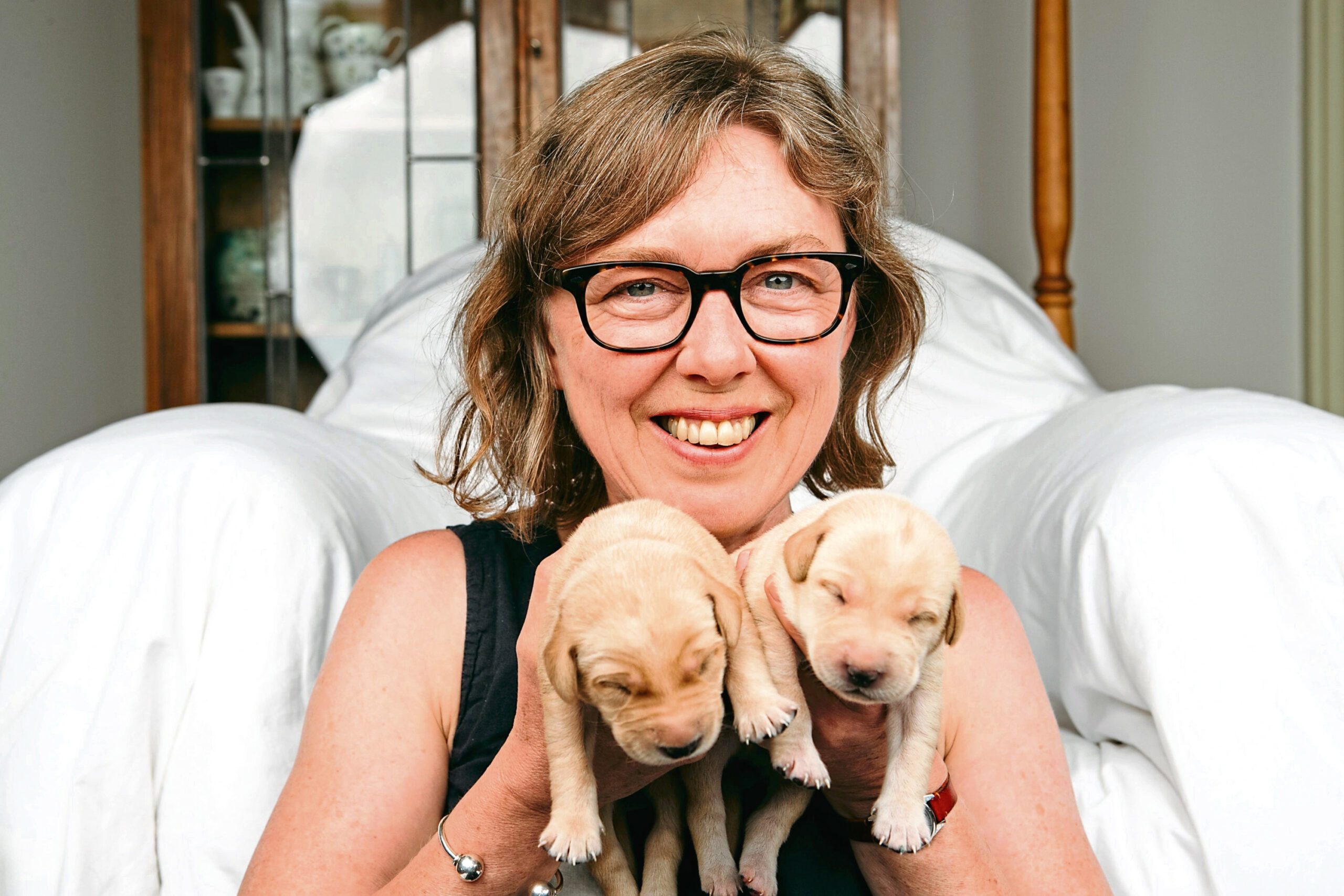 Fiona Rintoul with some of the pups