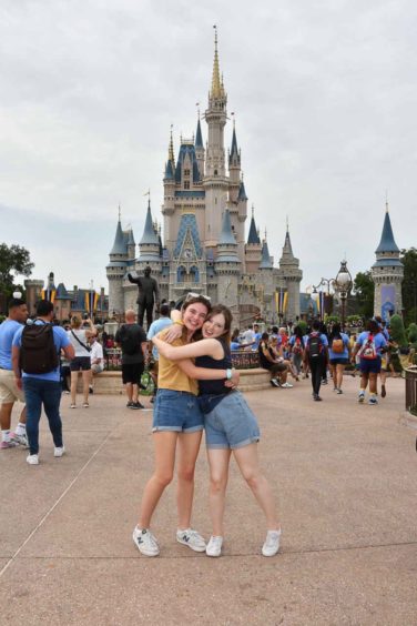 Iona with friend Hannah Chirnside at Walt Disney World’s Magic Kingdom in 2019