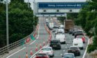 The M8 eastbound in Glasgow is congested on Friday with lanes closed due to work on supporting pillars