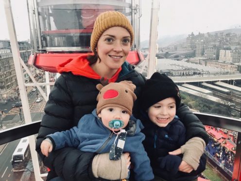 Sarah Anderson, who almost died after suffering heart failure, in Edinburgh with sons Hamish and Archie
