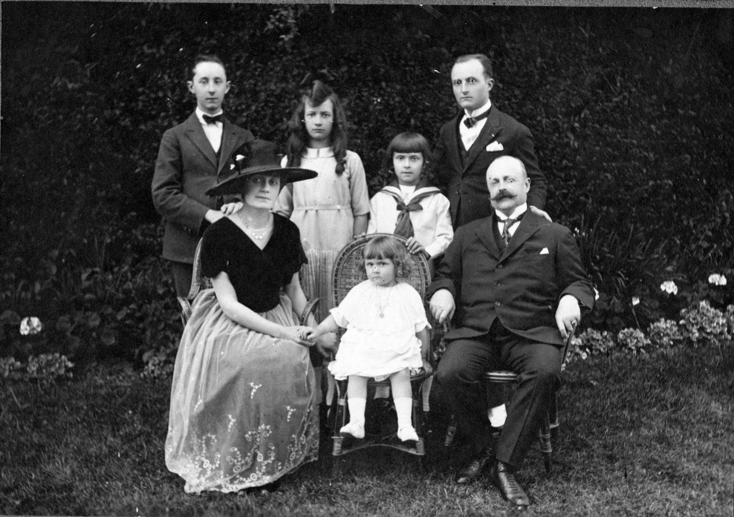 The Dior family in their garden, c. 1920
