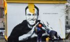 A mural in St Petersburg declaring Alexei Navalny a ‘hero of a new time’ is painted over by Russian authorities