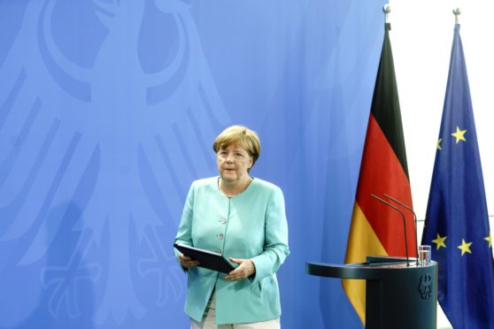 German Chancellor Angela Merkel at the helm in 2016