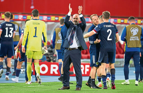 Steve Clarke applauds the Tartan Army after Tuesday night’s win over Austria in Vienna.