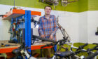 Wilf in the bike shop. (Ross Johnston/Newsline)
