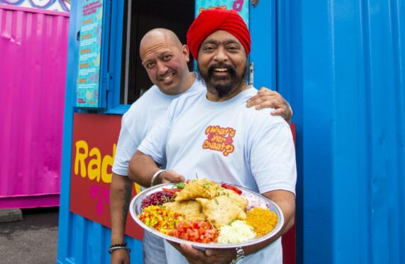 Tony Singh, right, and his brother Lucky serving up their tasty chaat