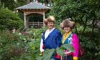 Dawa Sherpa and wife Angdiki in garden he helped create at Chelsea Flower Show