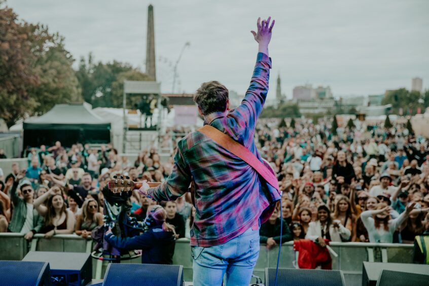 Ryan McMullan on stage at TRNSMT