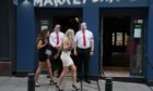 Bouncers and pubgoers in Bigg Market, Newcastle