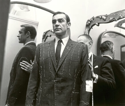 Anthony Sinclair fits Sean Connery for a suit for Dr No.