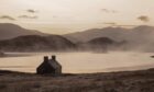 Fog hovers over Loch Stack, near a lone bothy, in Sutherland in an amazing image captured by photographer Richard Gaston during gruelling Cape Wrath trek