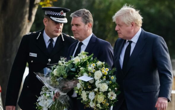 Essex chief constable Ben-Julian Harrington joins Sir Keir Starmer and Boris Johnston laying a wreath at Belfairs Methodist Church in Leigh-on-Sea yesterday