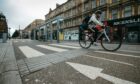 The new layout on Sauchiehall Street, Glasgow, places cycle lanes between bus stops and pavements, worrying disabled charities while some of the ridged tiling meant to warn blind pedestrians has been fitted the wrong way round