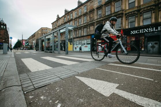 The new layout on Sauchiehall Street, Glasgow, places cycle lanes between bus stops and pavements, worrying disabled charities while some of the ridged tiling meant to warn blind pedestrians has been fitted the wrong way round