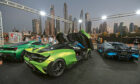 A luxury car show in front of Dubai’s skyline last week.