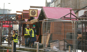 Set construction build a Christmas market in the Trongate area of Glasgow (Pic: Andrew Milligan/PA Wire)