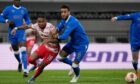 Calvin Bassey and Connor Goldson stood firm against Leipzig for most the game