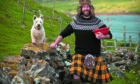 Hebridean Baker Coinneach MacLeod with mixing bowl, spurtle and trusty West Highland terrier Seoras.