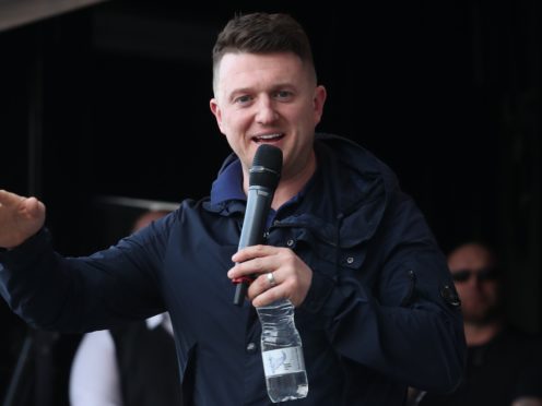 Former English Defence League leader Tommy Robinson as he addresses a protest over the BBC’s Panorama programme outside the BBC in MediaCityUK, Salford.