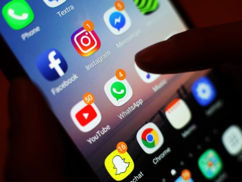 Social media addiction should potentially be treated as a disease, say MPs (Yui Mok/PA)