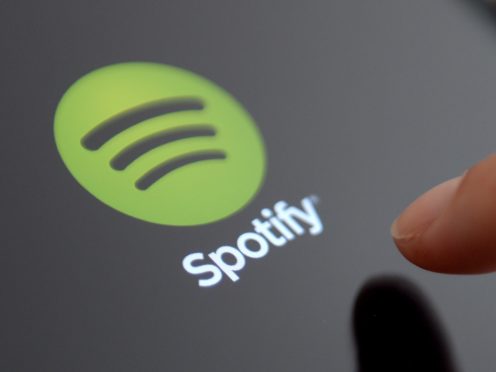 Spotify has hit the 100m paid user mark (Andrew Matthews/PA)