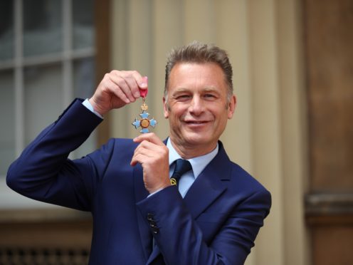 Chris Packham with his CBE following an investiture ceremony at Buckingham Palace (Yui Mok/PA)