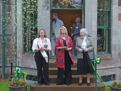Culture Secretary Fiona Hyslop, (left) actress Joanna Lumley (centre) and Dame Barbara Kelly (right) of the PPMBT celebrate the official opening of the new visitor centre (Neil Hanna/PA)