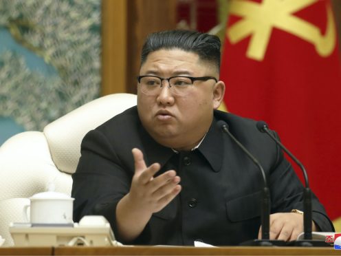 FILE – In this Nov. 15, 2020, file photo provided by the North Korean government, North Korean leader Kim Jong Un attends a meeting of the ruling Workers’ Party Politburo in Pyongyang, North Korea. Kim ordered at least two people executed, banned fishing at sea and locked down capital Pyongyang as part of frantic efforts to guard against the coronavirus and its economic damage, South Korea’s spy agency told lawmakers Friday, Nov. 27, 2020.(Korean Central News Agency/Korea News Service via AP)