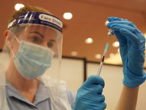Booster shots could begin in September, a minister said (Owen Humphreys/PA)