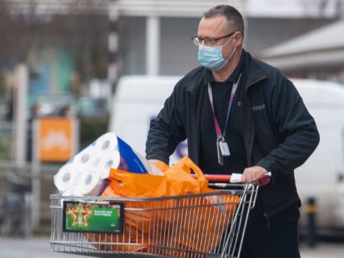 Supermarket sales in March fell compared with a year ago (Dominic Lipinski/PA)
