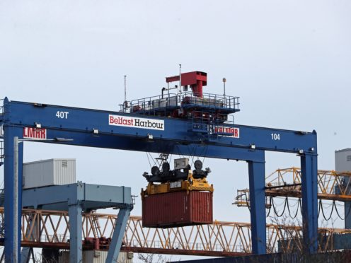 A cargo crate being moved in Belfast Port (PA)