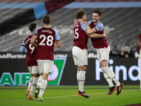 Craig Dawson (second right) celebrates West Ham’s second goal with his team-mates (Ian Walton/PA)