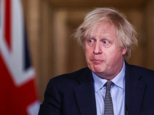 The Prime Minister is recognised for his famous blond mop (Hannah McKay/PA)