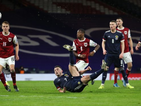 John McGinn earned a point for Scotland (Jane Barlow/PA)