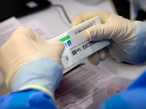 China’s top disease control expert has admitted the effectiveness of the country’s Covid-19 vaccines is low (Mark Schiefelbein/AP)