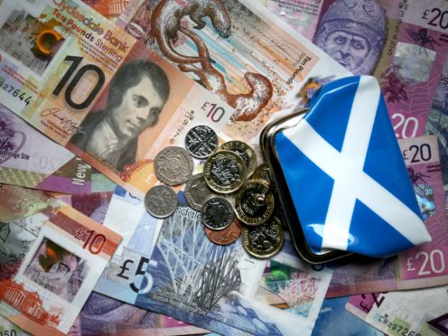 Public sector workers have seen their wages fall by 15% in real terms over the last decade, the STUC said (PA)