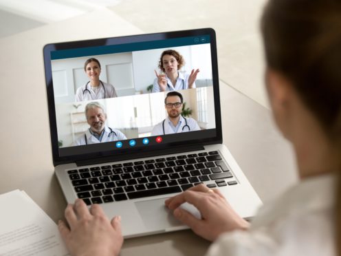 A House of Lords committee has said the Government must create a hybrid system for the NHS that embraces virtual consultations while allowing face-to-face appointments to continue (Zoom/PA)