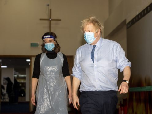 The Prime Minister during a visit to a vaccination centre at Jesus House For All The Nations (Geoff Pugh/Daily Telegraph/PA)
