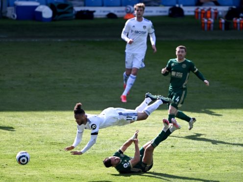 George Baldock, bottom, came off worst following his robust challenge on Tyler Roberts (Laurence Griffiths/PA)