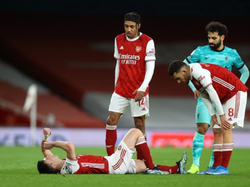 Kieran Tierney suffered knee ligament damage against Liverpool on Saturday (Julian Finney/PA)