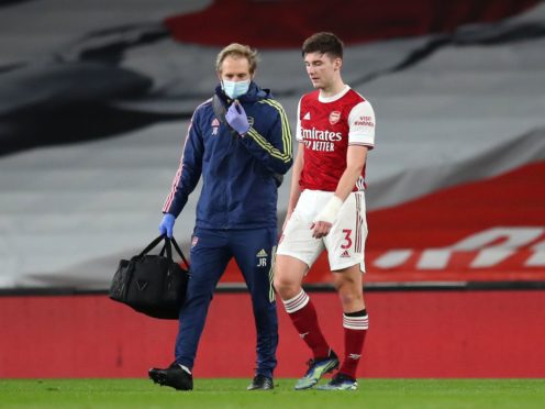 Kieran Tierney was forced off injured during Arsenal’s Premier League loss to Liverpool (Catherine Ivill/PA)